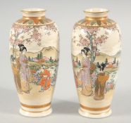 A PAIR OF JAPANESE SATSUMA VASES, in original wooden box, each painted with female figures in