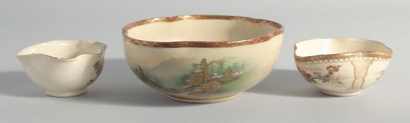 THREE JAPANESE SATSUMA BOWLS, the largest decorated with landscape scenes, character mark to base,