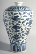A LARGE CHINESE BLUE AND WHITE MEIPING VASE, painted with flora, 43cm high.