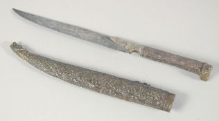 A 19TH CENTURY OTTOMAN BALKANS DAGGER, and sheath, 28cm long.
