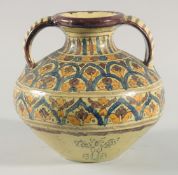 A FINE LARGE 19TH CENTURY NORTH AFRICAN TUNISIAN GLAZED POTTERY VASE, with twin handles, signed,