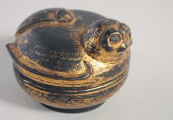 A GILT LACQUER CIRCULAR BOX AND COVER, in the form of a bird.