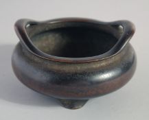 A GOOD CHINESE BRONZE TRIPOD CENSER, with six-character mark to base, 11.5cm diameter.