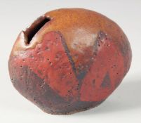 AN UNUSUAL CONTEMPORARY JAPANESE STUDIO POTTERY VASE, signed, in original wooden box, 17cm wide.