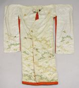 A LARGE CHINESE EMBROIDERED SILK ROBE, embroidered with gilt thread and depicting cranes, flowers