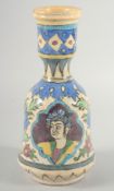 A PERSIAN QAJAR GLAZED POTTERY HUQQA BASE, painted with portrait and floral decoration, 27.5cm