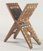 A FINE 19TH CENTURY OTTOMAN BONE AND MOTHER OF PEARL INLAID WOODEN QURAN STAND, with panels of
