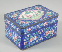 A CHINESE CANTON ENAMELLED RECTANGULAR BOX, the lid painted with a panel of two figures in a