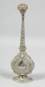 AN INDIAN WHITE METAL ROSEWATER SPRINKLER, 25.5cm high.