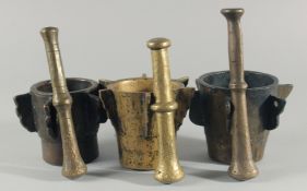 A COLLECTION OF THREE EARLY BRONZE PESTLE AND MORTARS, (six pieces).