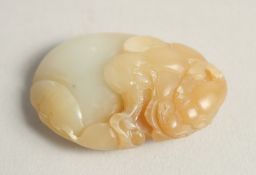 A SMALL CHINESE JADE CARVING, in the form of a lion dog, 4.5cm.