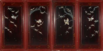 FOUR MOTHER OF PEARL AND ABALONE INLAID LACQUERED WOOD PANELS, each depicting birds and blossoming