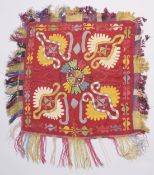 AN UZBEK SUZANI EMBROIDERED TEXTILE, 85cm x 80cm.