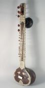 AN INDIAN BONE OVERLAID SITAR, 122cm long.