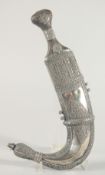A FINE LARGE 19TH CENTURY RHINO HORN HILTED ARAB YEMENITE SILVER JAMBIYA DAGGER, 34.5cm in sheath.