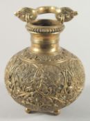 A 19TH CENTURY SRI LANKAN BATAVIAN BRASS CEREMONIAL VESSEL, with snake form handle, the body with
