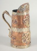 A CHINESE COPPER AND BRASS JUG, with applied dragons, 19cm high.