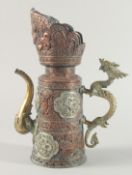 AN USUAL ORIENTAL OPENWORK COPPER AND BRASS EWER, with dragon formed handle and spout, the body with