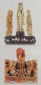 TWO CHINESE SOAPSTONE CARVINGS, one carved with foo dogs, the other of immortals on a soapstone
