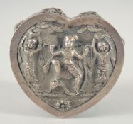 A SMALL BURMESE OR INDIAN HEART SHAPED BOX, relief decorated with figures, 7.5cm x 7cm.