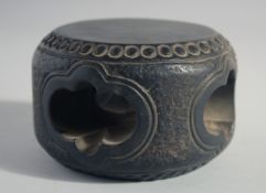 A CHINESE CARVED STONE STAND, 10.5cm diameter.