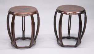 A GOOD PAIR OF CHINESE ROSEWOOD BARREL SEATS, with burr wood panelled tops on pierced curving