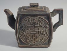 A CHINESE YIXING TEAPOT, decorated with longevity symbol, base with four-character mark, 16cm