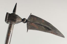 A PERSIAN QAJAR STEEL HAND AXE, with traces of silver inlay, 61.5cm long.