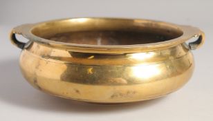 A LARGE CHINESE BRONZE CENSER, 22.5cm wide (handle to handle).