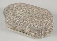 A FINE 19TH CENTURY SRI LANKAN SILVER BOX, with embossed foliate decoration, weight 55g, 9cm x 5cm.
