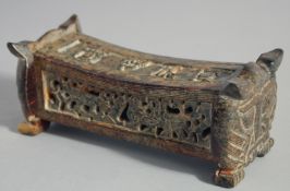 AN UNUSUAL CARVED HARDSTONE SECTIONAL PILLOW, 17.5cm long.