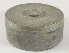 A RARE LARGE 16TH CENTURY MAMLUK TINNED COPPER CIRCULAR BOX, with engraved decoration of calligraphy