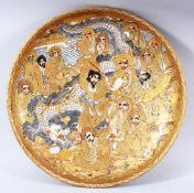 A GOOD JAPANESE SATSUMA PORCELAIN DISH, painted with various figures / deities in gilt and a white