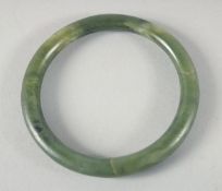 A JADE BANGLE.