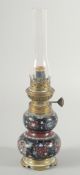 A SMALL JAPANESE CLOISONNE GOURD-SHAPE LAMP, decorated with roundels of flowers and birds, 29cm high