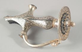 AN INDIAN STEEL SWORD HILT, with floral decoration, 18.5cm long.