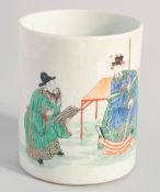 A CHINESE FAMILLE VERTE PORCELAIN BRUSH POT, painted with two figures, 12.5cm high.