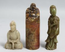 THREE CHINESE SOAPSTONE CARVINGS, including a cylindrical seal carved with buddha and incised