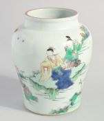 A CHINESE FAMILLE VERTE PORCELAIN VASE, painted with figures by water, 16cm high.