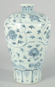 A CHINESE BLUE AND WHITE PORCELAIN MEIPING VASE, decorated with flower heads and scrolling vine,