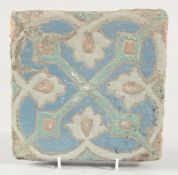 A PERSIAN SAFAVID CUERDA SECA POTTERY TILE, 20cm square.