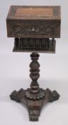 A LATE 19TH CENTURY INDIAN CARVED ROSEWOOD WORKBOX ON STAND, with hinged top, carved sides and