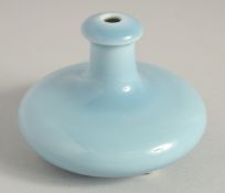 A SMALL CHINESE CLAIR-DE-LUNE POWDER BLUE GLAZE PORCELAIN VASE, on three moulded feet, with six-