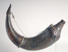 A LARGE 18TH CENTURY OTTOMAN OR INDIAN HORN POWDER FLASK, 33cm wide.