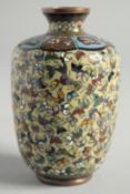 A SMALL CHINESE CLOISONNE ENAMEL VASE with butterflies. 3.5ins high.