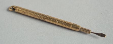 A 9CT GOLD CIGAR PRICKER.