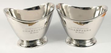 A PAIR OF CUVEE PRESTIGE CHAMPAGNE WINE COOLERS 14ins long.