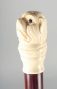A CARVED BONE HANDLE WALKING STICK 