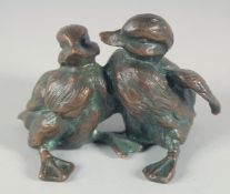 A SMALL BRONZE OF TWO CYGNETS. 4ins long.