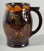 A ROYAL DOULTON POTTERY GOLFING JUG. 5ins high.